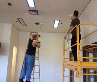 Lane County Jail inmates work on cleaning up additional ares in preparation for opening more jail beds.  (Lane County Sheriff's Office photo)